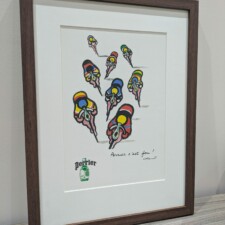 Inlijsting vintage koersreclame met ontspiegeld glas